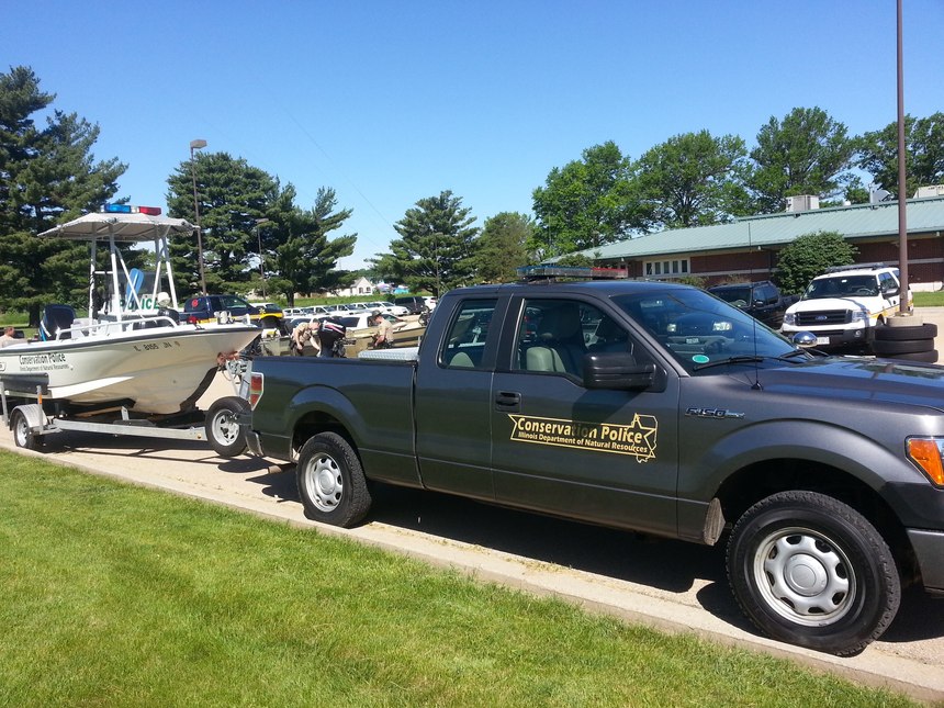 Game wardens are equipped to work both land and waterways.