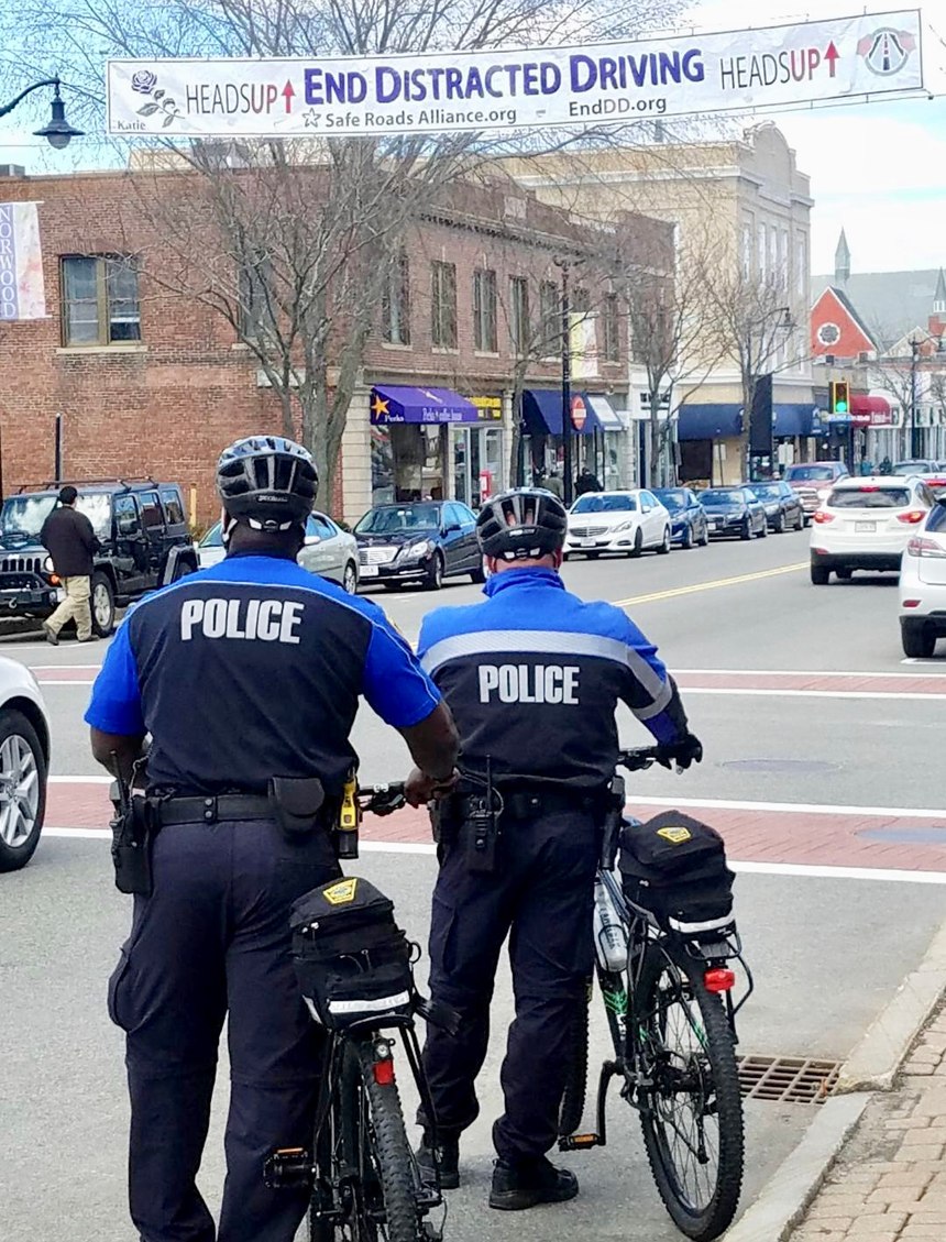Norwood bike patrol officers focus on reducing distracted driving in the downtown sector.