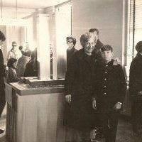At 10, Denis attended a groundbreaking ceremony for the World Trade Center with his family. Denis and his grandma were photographed with a model of the Towers.