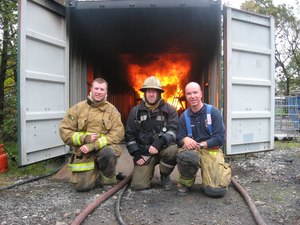 Left to right: Jason Caughey, Jim Mastin and Dr. John Culbertson, training at Lancashire Fire Rescue Service in England.