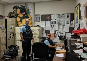 Two CPD officers hard at work. (image/GovX)