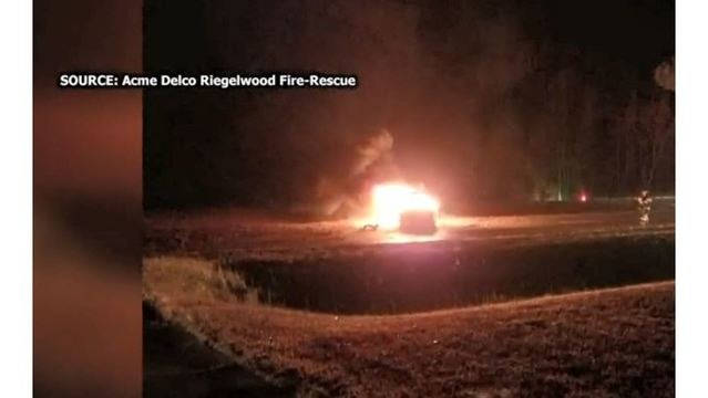 The tractor-trailer also plowed into a stranded family's car, causing an explosion. (Photo/Acme-Delco-Riegelwood Fire-Rescue)