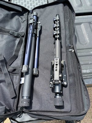 The entire system packs down to these two pieces that are around 2 feet long.