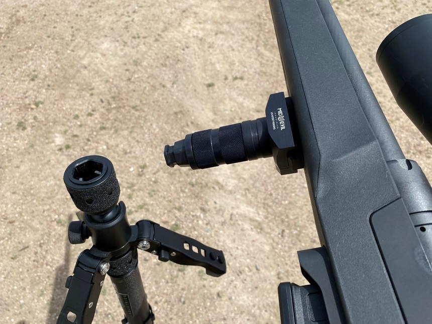 I was able to insert the rifle into the entire monopod by pulling down on the QD collar and clicking it into place.