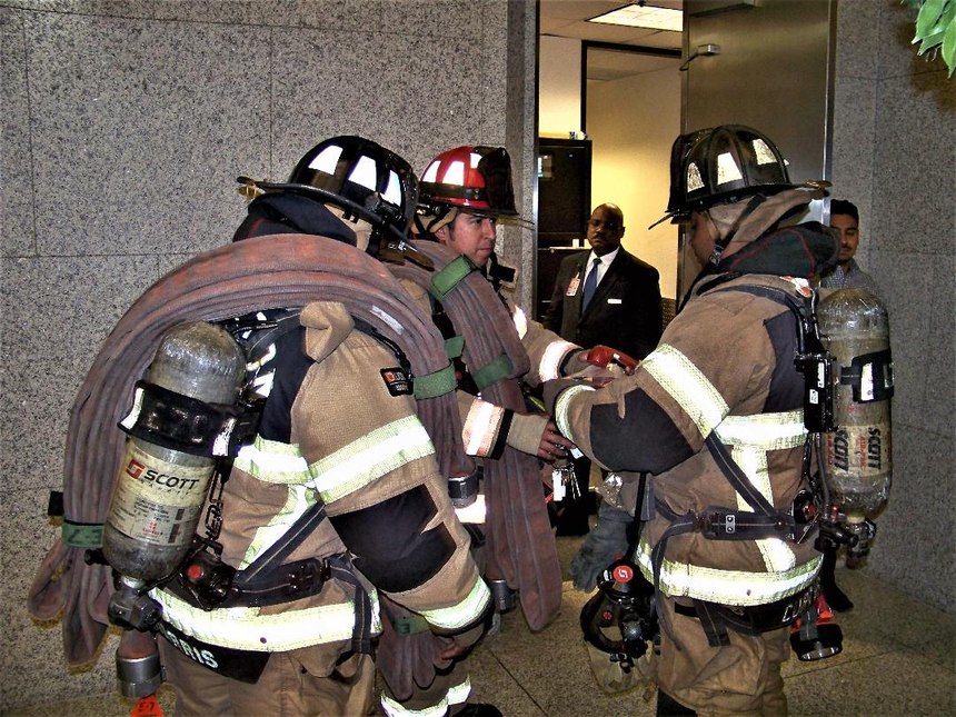 The initial attack team should report directly to the FCC to receive the necessary equipment provided by Lobby Control. Here, is also where face-to-face communications and updates as well as other information is passed on before ascending in the elevator or taking the stairs.