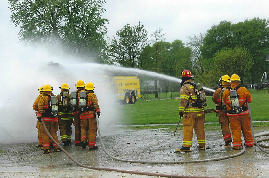 A Denmark Fire & Rescue crew works to put out a fire.