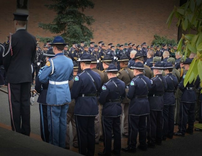 Being part of a memorial service is a sacred and heavy burden to bear for those who wear the Honor Guard uniforms.