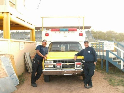 Navajo Tribal Police Officer Houston Largo (left), who was killed in the line of duty in 2017, is pictured with Bud Paine in 2009.