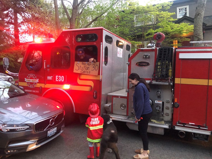 During Friday Night Lights, Seattle members flash the apparatus lights to thank the community for staying home, and to let them know the department is here to serve during this challenging time.