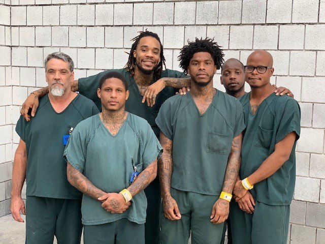The inmates pictured from left to right helped save Gwinnett County Deputy Patrick Edmond: John Queen, Darius Wilson, Matthew Fountain, Jattir Moton, Rodrequs Wells and Brad Louden
