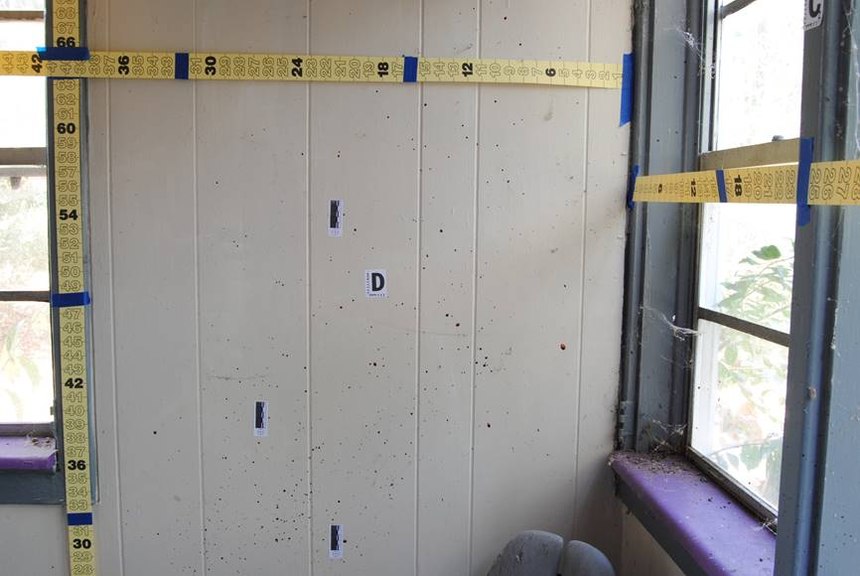 My team’s room in the “blood house.” Each term the city of Oak Ridge donates a house (slated for demolition) for use during bloodstain pattern analysis week. The technique used here is called roadmapping.