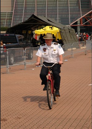 Jacob Oberman, paramedic and field supervisor for the New Orleans Health Department, cycles through a base camp located at the Morial Convention Center in New Orleans during Hurricane Katrina response efforts. (Photo/Miles Jeffery Watts, Jr.)