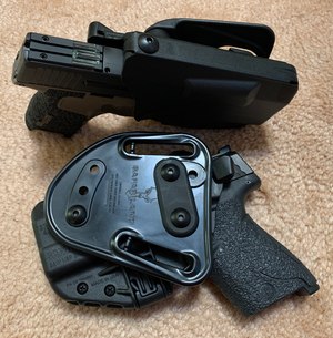 The Safariland Model 7371 thumb release holster.