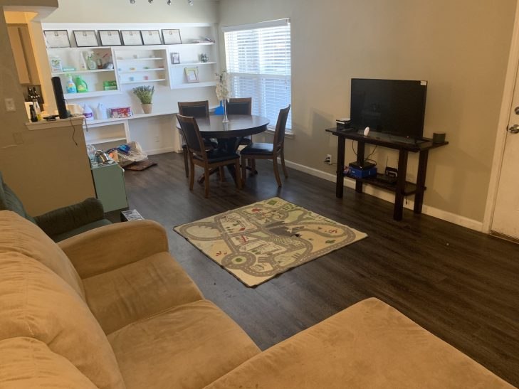 This picture shows the family's living room, furnished with items purchased by Dallas police officers.
