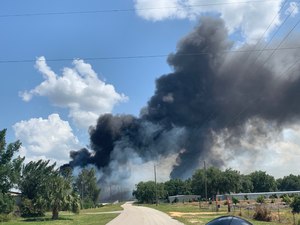 Propane plant burning to the left, trailers burning to the right. (Photo/Marc Bashoor)