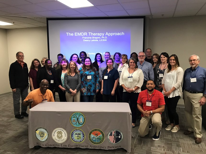 Mental health professionals pose for a picture ahead of a PCIS held by SCLEAP.