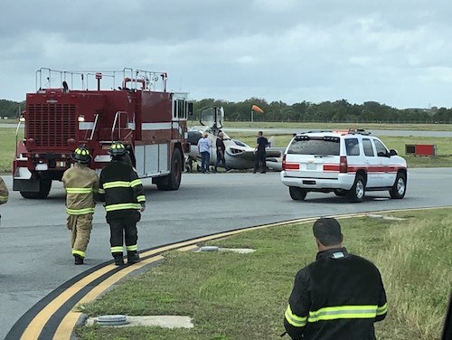 Firefighters were nearly burned, or worse, in the process of trying to push an aircraft back on the runway of an airshow.