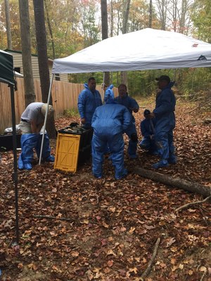 Suiting up for the grave excavation exercise at the body farm.