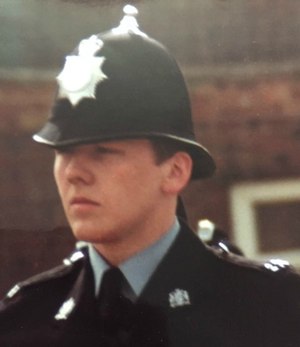 The author pictured at training school graduation in 1982.