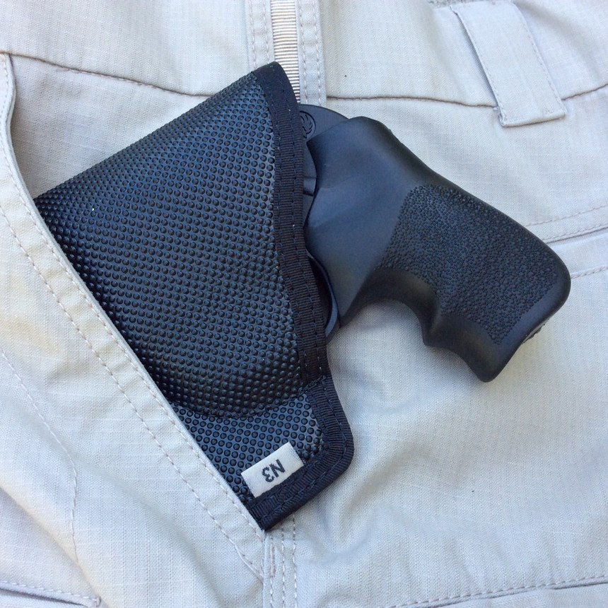 The DeSantis Nemesis holster is a popular and efficient way to safely carry a snubby revolver as your BUG. Stowed in your support side pocket, you will have ready access to your lifesaving backup.