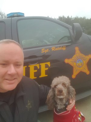 Sergeant Jason Ratcliff pictured with therapy K9 Kit.