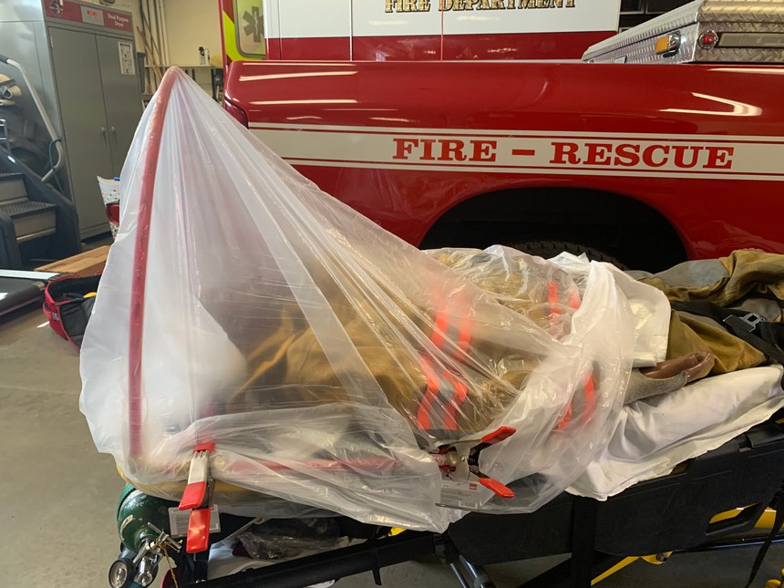 Crews from the Ridgefield (Connecticut) Fire Department developed a device that could be deployed in the field or rapidly attached to a stretcher to provide a protective barrier between patients and the caregivers delivering life-saving interventions.