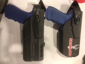 The Safariland duty holsters for compact weapon lights are smaller in profile and more comfortable for the officer, as seen on the right. (Photo/Mike Wood)