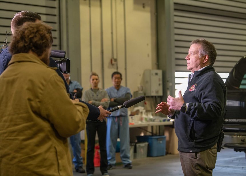 Medical Director Dr. Michael Sayre briefs the media about the testing site.