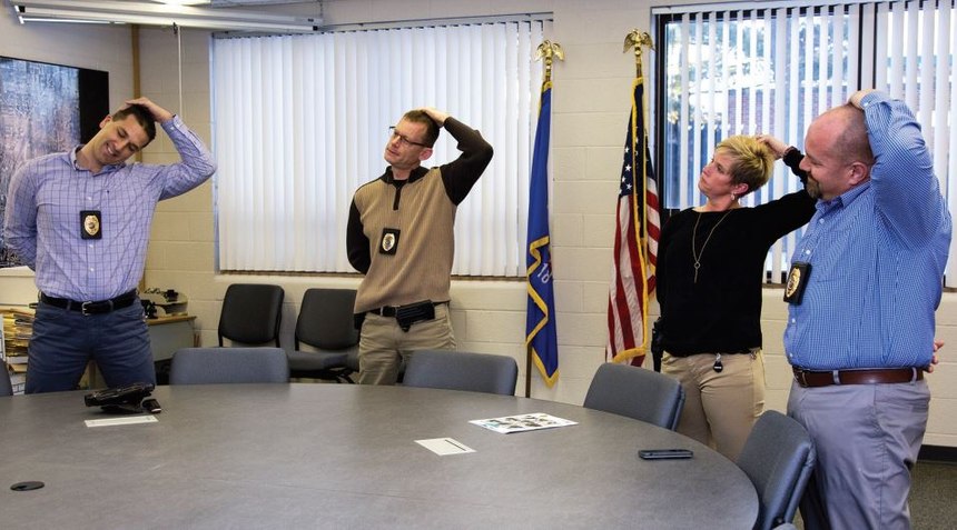 Stretching during briefings is a daily occurrence at SPPD.