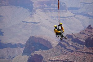 A short-hauler and simulated patient are extracted from a slope below the rim. (Photo/Courtesy of the National Park Service)