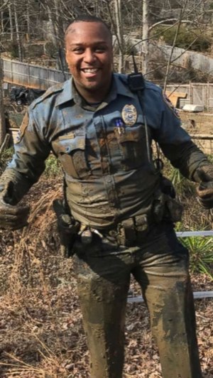 Toney is pictured in the aftermath of pursuing a wanted suspect through the mud of a drained lakebed. “He ended up spending hours that night trying to clean all the dirt. He had to take his gun to the range to get them to unpack from where the mud went up in his barrel,” Wilson said.