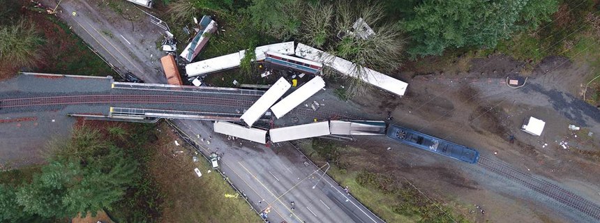 The as-found scene of the Dupont train incident where 11 of 14 rail cars of an Amtrak derailed, killing three people and injuring 62 passengers and 6 crew members.