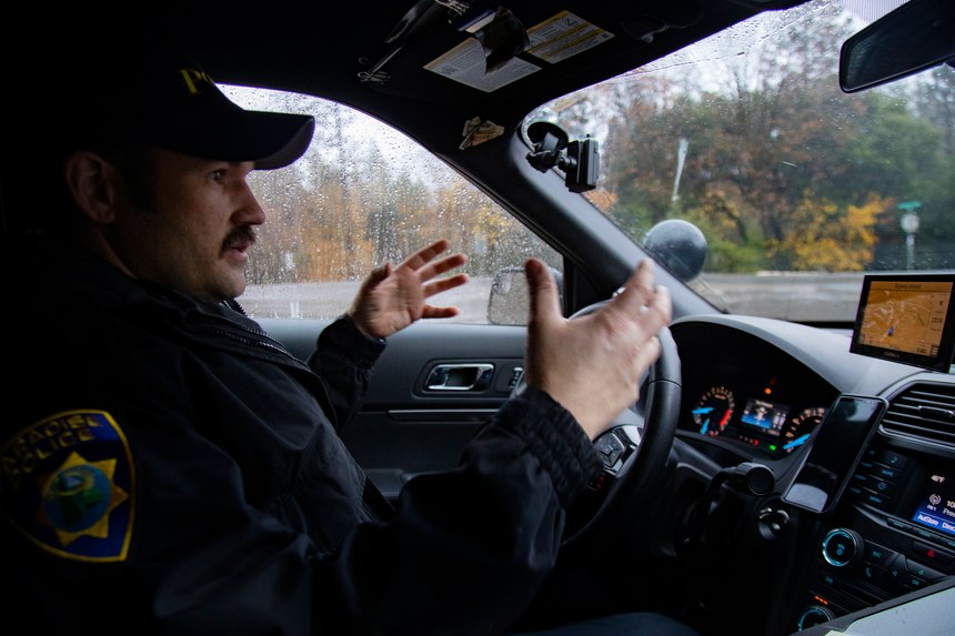 Paradise Police Officer Perry Walters patrols the streets, passing the endless number of burned structures, even missing some turns because his once familiar landmarks are now gone on Nov. 27, 2018 in Paradise, Calif. He is describing the scene of having a Pepsi truck block the intersection and unload boxes of the soft drink to form a protective barrier for drivers. (Gina Ferazzi/Los AngelesTimes/TNS)