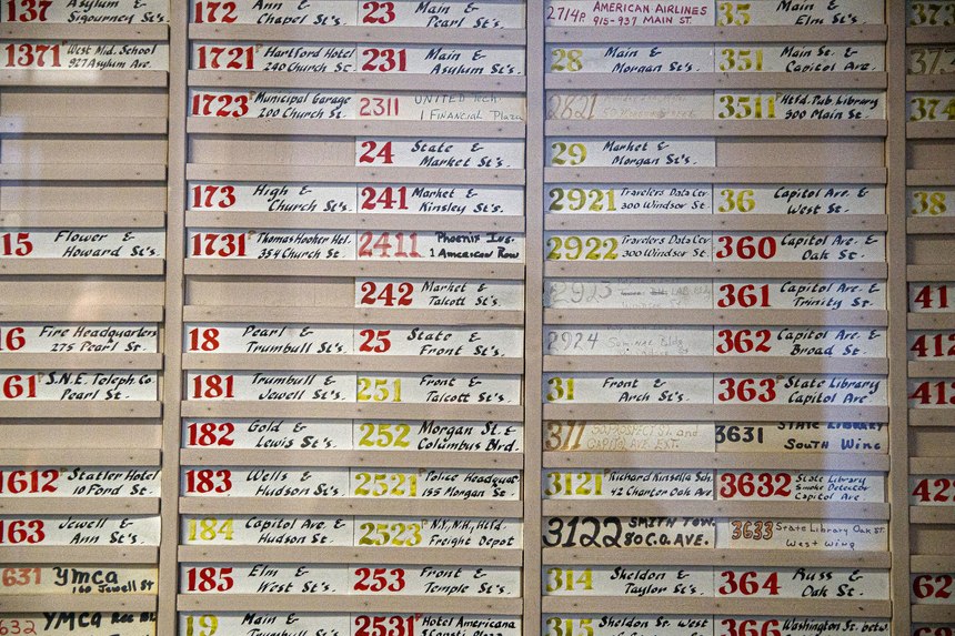 Alarm box labels from decades past are still on the wall of the former Hartford Fire Department headquarters on Pearl Street. (Photo/Mark Mirko, Hartford Courant)