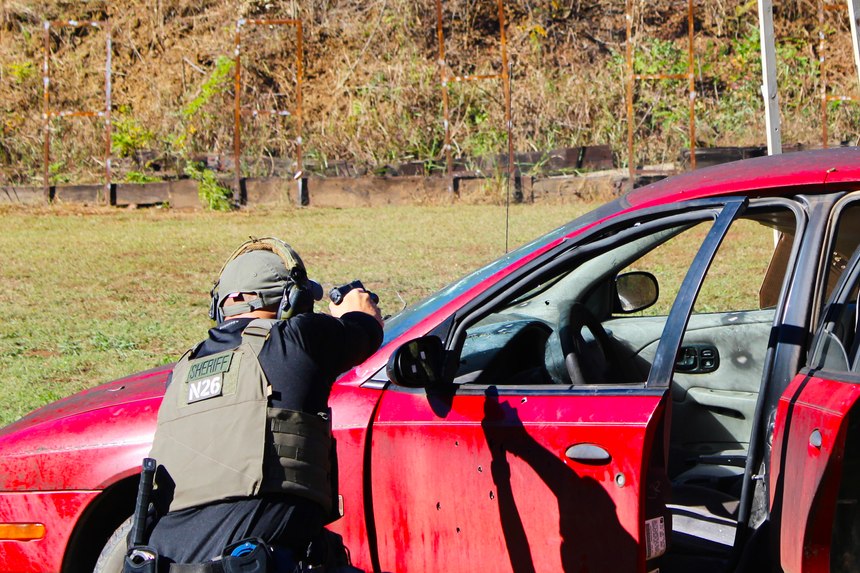 Correct body positioning maximizes the vehicle’s use as cover.