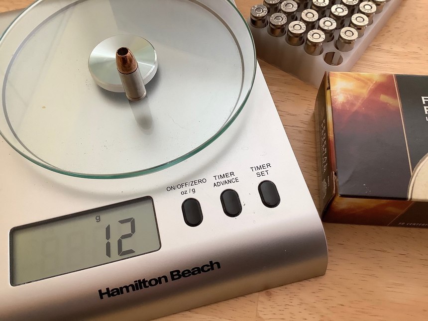 The best way to check for a proper powder charge is to weigh each cartridge individually.