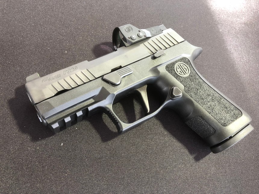 The Sig P320 RXP XCompact combines the upgraded X Features with the ROMEO1 PRO reflex sight. (Photo/Mike Wood)