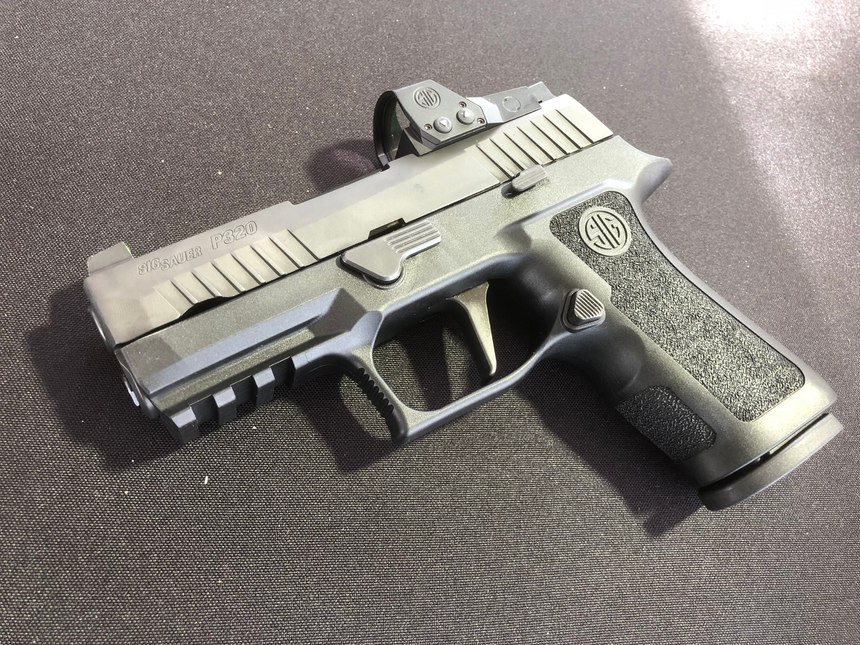 The Sig P320 RXP XCompact combines the upgraded X Features with the ROMEO1 PRO reflex sight.
