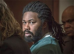 Jesse Matthew Jr., right, looks toward the gallery while appearing in court in Fairfax, Va.