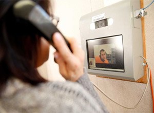 Jennifer Walter does a video visit with her son Ryan Thurow, 21, from a trailer in the parking lot of the Napa County Corrections Dept. County Jail in Napa. (Photo Scott Strazzante/The Chronicle)