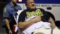 EMTs load hurt pro wrestler into ambulance