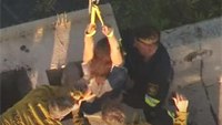 Firefighters rescue woman stuck in chimney