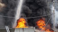 Fire burns Wash. metal plant, prompts chemical concerns