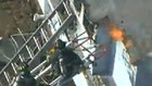 Mass. firefighter jumps from 2nd story battling fire