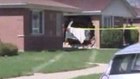 Man dies after crashing van into firefighter's home