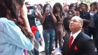Firefighter proposes to girlfriend with flash mob