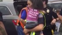 NJ sheriff's deputy rescues child from hot minivan 