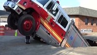 Ky. fire truck falls through collapsed parking lot
