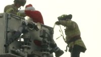 Ind. firefighters 'rescue' Santa from rooftop