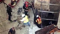 Firefighters rescue worker stuck in concrete trench